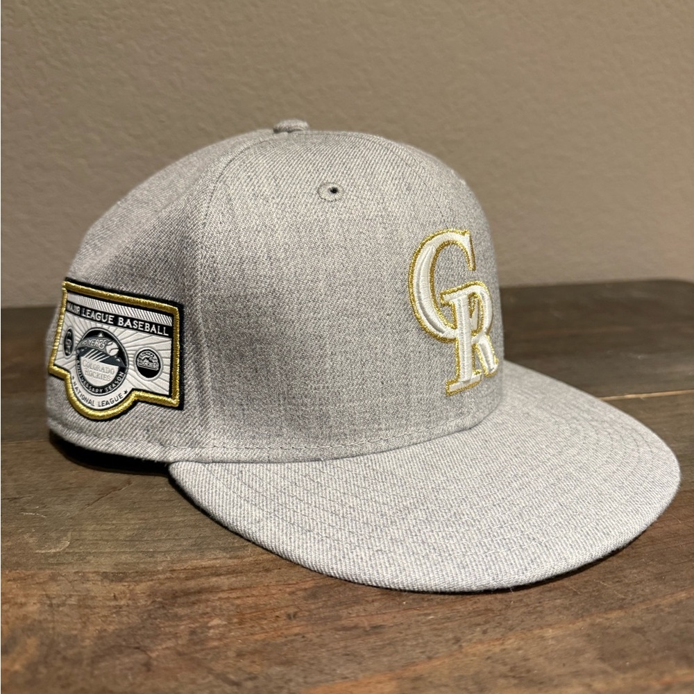 New Era Colorado Rockies hat- grey with gold accents.